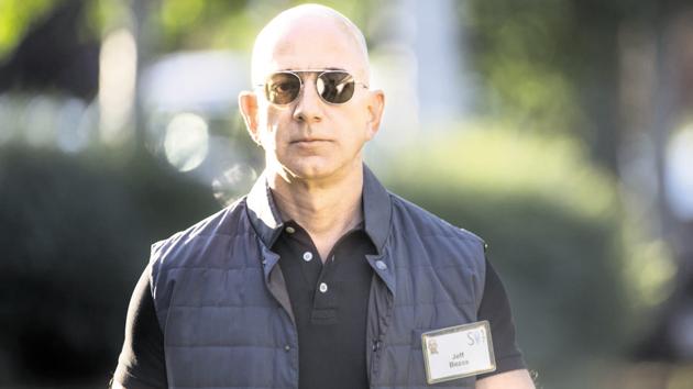 On cue, India this month rolled out constraints on foreign e-commerce players including Jeff Bezos-led Amazon and Walmart-owned Flipkart, which together control 70 percent of its online shopping. (Bloomberg) On cue, India this month rolled out constraints on foreign e-commerce players including Jeff Bezos-led Amazon and Walmart-owned Flipkart, which together control 70 percent of its online shopping. (Bloomberg)