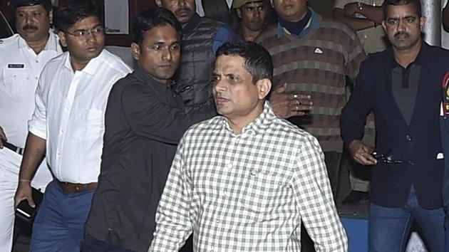 Kolkata police commissioner Rajeev Kumar outside his residence on Sunday evening.(PTI)