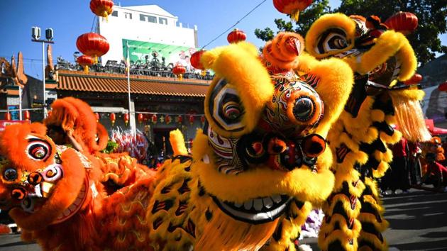 Lion dancers perform during Lunar New Year celebrations in Yangon, Myanmar. (Ye Aung Thu / AFP) Lion dancers perform during Lunar New Year celebrations in Yangon, Myanmar. (Ye Aung Thu / AFP)
