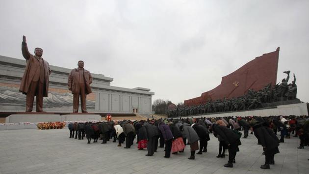 In the North Korean capital, Pyongyang, visitors left bouquets of flowers at statues of former leaders Kim Il Sung and his son, Kim Jong Il. (Jon Chol Jin / AP) In the North Korean capital, Pyongyang, visitors left bouquets of flowers at statues of former leaders Kim Il Sung and his son, Kim Jong Il. (Jon Chol Jin / AP)