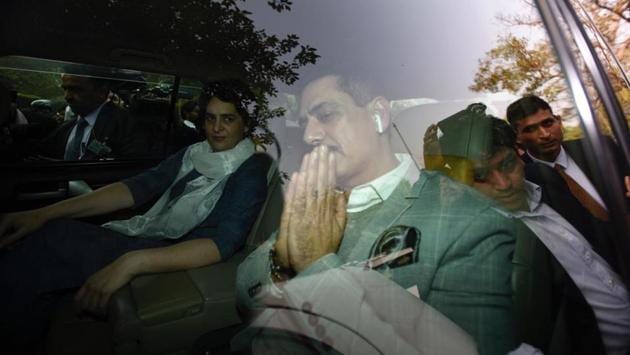 Robert Vadra, brother-in-law of Congress president Rahul Gandhi, reached the Enforcement Directorate office in Delhi today after the agency summoned him in a money laundering case. Vadra was dropped off at the office by his wife Congress general secretary Priyanka Gandhi Vadra. His case relates to allegations of money laundering in the purchase of a London-based property at 12, Bryanston Square. (Burhaan Kinu / HT Photo)