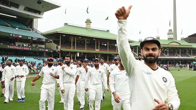(FILES) In this file photo taken on January 7, 2019 India's captain Virat Kohli (R) gestures as the India team celebrates their series win on the fifth day of the fourth and final cricket Test against Australia at the Sydney Cricket Ground (AFP) (FILES) In this file photo taken on January 7, 2019 India's captain Virat Kohli (R) gestures as the India team celebrates their series win on the fifth day of the fourth and final cricket Test against Australia at the Sydney Cricket Ground (AFP)
