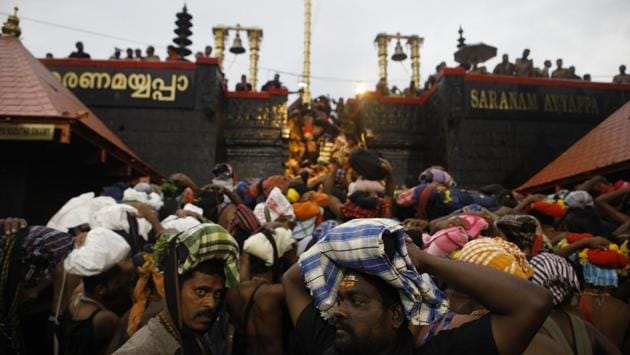 The Supreme Court today reserved its judgment while hearing the review petitions on its order allowing entry to all women in the Sabarimala Temple. During the course of the hearing, the Kerala government submitted before the Supreme Court that exclusion of women is “not essential to Hindu religion”. The state government made its submission during the hearing of the review petitions against the Court’s Sabarimala order allowing women entry into the hill shrine. (Vivek Nair / HT File)