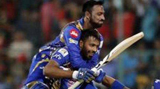 Krunal Pandya, left, and Hardik Pandya celebrate their win over Royal Challengers Bangalore.(AP) Krunal Pandya, left, and Hardik Pandya celebrate their win over Royal Challengers Bangalore.(AP)
