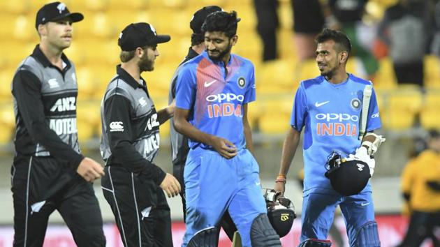 New Zealand players walk off with the final Indian batsman after they won by 80 runs. (AP)
