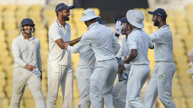 Nagpur: Saurashtra team players celebrate the dismissal of Vidarbha opener Sanjay Ramaswamy.(PTI)