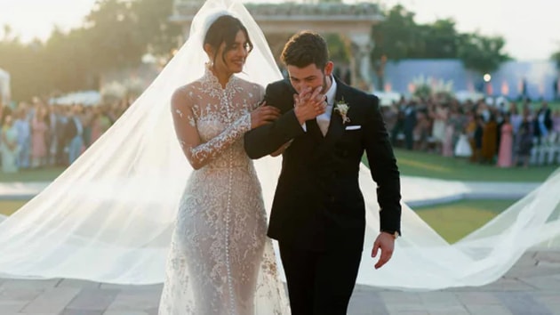 Nick Jonas, Nick Jonas and her 75-feet veil.