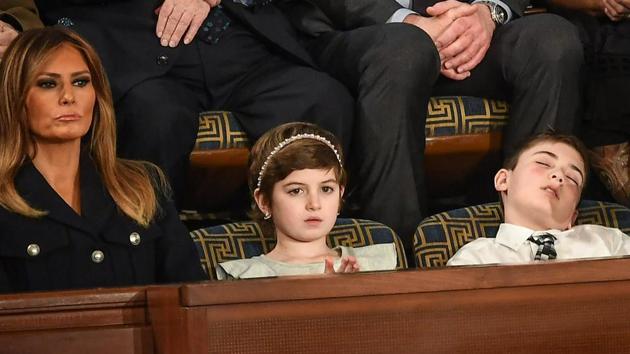 Seated two seats up from First Lady Melania Trump, middle school student from Delaware Joshua Trump, not related to the US President, nodded of midway through the State of the Union address.(AFP)