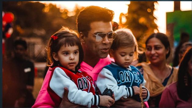 Karan Johar with his kids, Roohi and Yash, at their birthday bash in Mumbai.(Varinder Chawla)