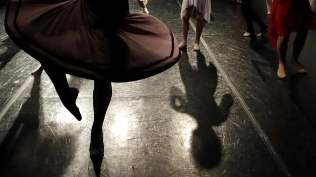 Young dancers warm up for the Youth America Grand Prix North America regional semi-finals at Dominican University Performing Arts Center in River Forest, Illinois. (Nam Y. Huh / AP)