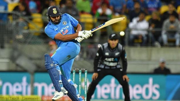 Rohit Sharma plays a shot during the first Twenty20 match against New Zealand.(AFP)