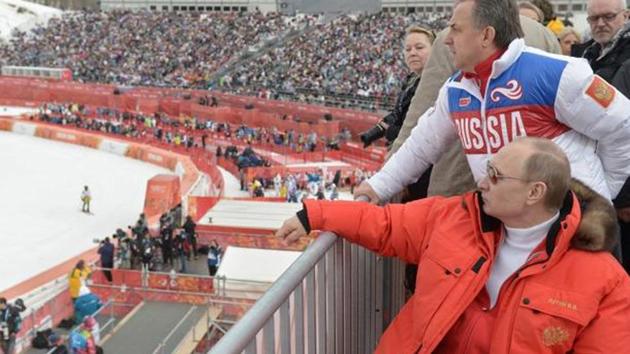 File image of Russian President Vladimir Putin, foreground, watches downhill ski competition of the 2014 Winter Paralympics in Roza Khutor, mountain district of Sochi, Russia. (AP) File image of Russian President Vladimir Putin, foreground, watches downhill ski competition of the 2014 Winter Paralympics in Roza Khutor, mountain district of Sochi, Russia. (AP)