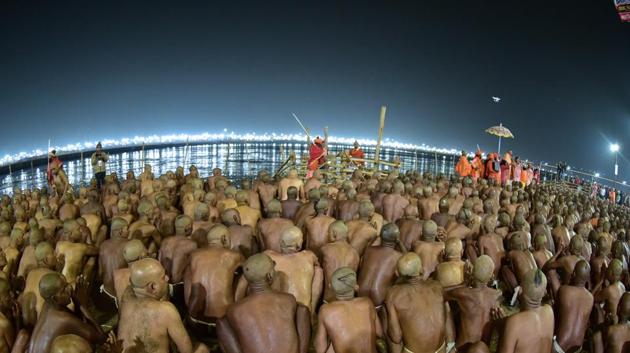 Newly initiated Naga Sadhus undergo ‘deeksha’ -- the initiation ceremony at the bank of river Ganga in Prayagraj, Uttar Pradesh. (Sheeraz Rizvi / HT Photo) Newly initiated Naga Sadhus undergo ‘deeksha’ -- the initiation ceremony at the bank of river Ganga in Prayagraj, Uttar Pradesh. (Sheeraz Rizvi / HT Photo)