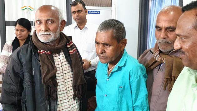 Murlidhar Dwivedi (in blue shirt) with his family and brothers in Kota, February 7, 2019.(HT Photo)