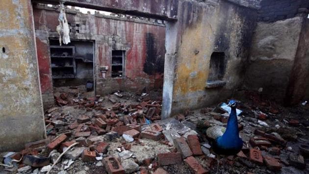 Homes burnt and looted at Bahawadi village, in Muzaffarnagar, where Hindu-Muslim riots broke out in September 2013.((Raj K Raj/ HT file photo))