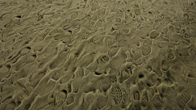 Shoe prints of devotees are seen on the bank of the river Ganga at the Kumbh Mela in Prayagraj, Uttar Pradesh. (Anushree Fadnavis / REUTERS) Shoe prints of devotees are seen on the bank of the river Ganga at the Kumbh Mela in Prayagraj, Uttar Pradesh. (Anushree Fadnavis / REUTERS)