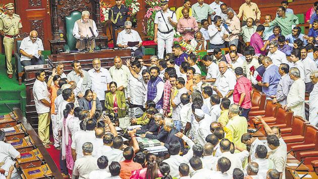 Bengaluru: BJP legislators raise slogans as Karnataka Governor Vajubhai Vala addresses the joint session of Assembly on the first day of the Budget Session at Vidhan Soudha in Bengaluru, Wednesday, Feb 6, 2019.(AP)