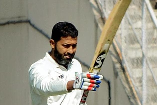 Vidarbha batsman Wasim Jaffer celebrates his century on the first day of Ranji Trophy cricket match against Mumbai, in Nagpur, Sunday, Dec. 30, 2018.(PTI)