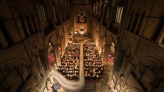 Members of the congregation take part in a candlelit procession as they attend the Candlemas Festal Eucharist service at Ripon Cathedral in Ripon, northern England. (Oli Scarff / AFP)