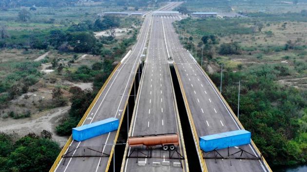 Aerial view of the Tienditas Bridge, in the border between Cucuta, Colombia and Tachira, Venezuela, after Venezuelan military forces blocked it with containers ahead of an anticipated humanitarian aid delivery. (Edinson Estupinan / AFP)