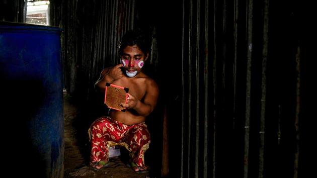 A circus artist applies makeup before a performance at the Jumbo Circus in Chennai. Jumbo Circus was founded in 1977 and is touring the country with a 160-member troupe. (Arun Sankar / AFP) A circus artist applies makeup before a performance at the Jumbo Circus in Chennai. Jumbo Circus was founded in 1977 and is touring the country with a 160-member troupe. (Arun Sankar / AFP)