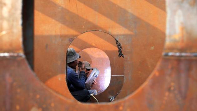 Workers weld iron sheets as they build a new ferry at a dockyard in Dhaka, Bangladesh. (Mohammad Ponir Hossain / REUTERS)