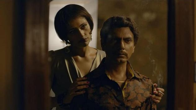 Nawazuddin Siddiqui with Kubbra Sait in a still from Sacred Games season 1.