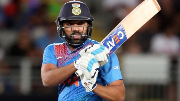 Rohit Sharma plays a shot during the second Twenty20 international match between New Zealand and India.(AFP)