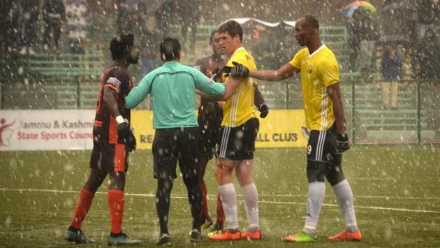 Real Kashmir’s Gnohere Krizo (R) and Mason Robertson (2nd R) talk with the referee. Scotland’s David Robertson, came on as coach while Adidas agreed to a kit sponsorship -- the only Indian team to get the sportswear giant’s money. “We found our calling when we got to know... how the team has set on a mission to bring a positive change in the valley,” said Adidas marketing chief Sharad Singla. (Tauseef Mustafa / AFP)