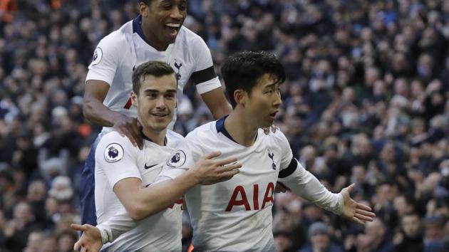 Tottenham Hotspur's Son Heung-min, right, celebrates with teammates after scoring his side's third goal against Leicester City.(AP)