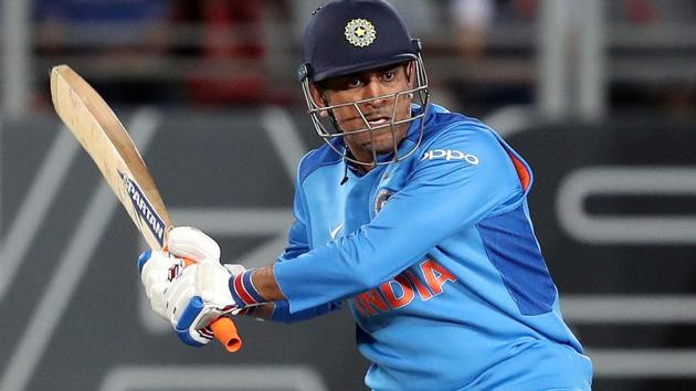 MS Dhoni plays a shot during the second Twenty20 international match between New Zealand and India.(AFP)