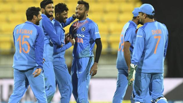 Hardik Pandya, center, celebrates with teammates after dismissing New Zealand's Colin de Grandhomme. (AP) Hardik Pandya, center, celebrates with teammates after dismissing New Zealand's Colin de Grandhomme. (AP)