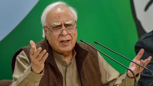 Senior Congress leader Kapil Sibal addresses a press conference at AICC headquarters in New Delhi, Sunday.(PTI)