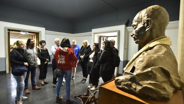 Tourists inside the Gandhi Museum, near Rajghat, in New Delhi. The national capital has, in recent years, emerged as a popular Gandhi tourism destination, with several tour companies taking foreign tourists on the Gandhi trail across the city. (Sanjeev Verma / HT Photo)
