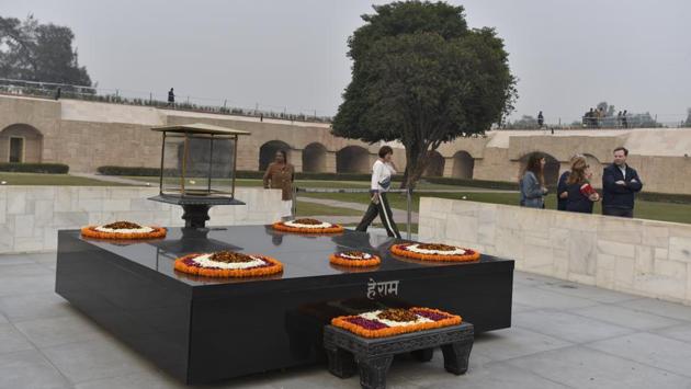 Tourists at Rajghat. “They are very intrigued why a man of non-violence would be put to death in such a violent manner. The Britishers find more affiliation with him than tourists from other countries. Everyone wants to know if the Gandhian philosophy of non-violence is practical in today’s stressful and intolerant world,” said Chetan Shankar Jha, a travel guide at Intrepid Travel. (Sanjeev Verma / HT Photo)