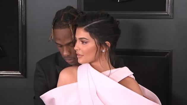 <p>Kylie Jenner made a splash at the Grammy red carpet wearing pink Balmain Haute Couture. She posed for photos with her six-time Grammy nominated boyfriend, Travis Scott who later performed on stage. Scott donned all black and let his girlfriend steal the red carpet spotlight as the couple shared a kiss for the cameras.</p>