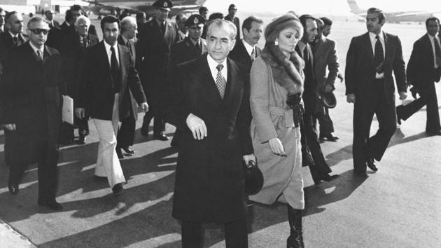 Shah Mohammad Reza Pahlavi and Empress Farah Diba walk on the tarmac at Mehrabad Airport in Tehran. The shah abandoned the Peacock Throne on January 16, departing Iran at the controls of a jetliner, never to return. (AP File) Shah Mohammad Reza Pahlavi and Empress Farah Diba walk on the tarmac at Mehrabad Airport in Tehran. The shah abandoned the Peacock Throne on January 16, departing Iran at the controls of a jetliner, never to return. (AP File)