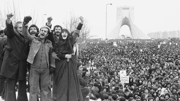 More than a million supporters of an Islamic Republic assembled around the Shayad monument, in Tehran on January 16. The shah’s departure left the country euphoric with leftist and secular groups jumping to back the Ayatollah as a figurehead despite ideological differences in the expectations of political gains once the dust settled. (Aristotle Saris / AP) More than a million supporters of an Islamic Republic assembled around the Shayad monument, in Tehran on January 16. The shah’s departure left the country euphoric with leftist and secular groups jumping to back the Ayatollah as a figurehead despite ideological differences in the expectations of political gains once the dust settled. (Aristotle Saris / AP)