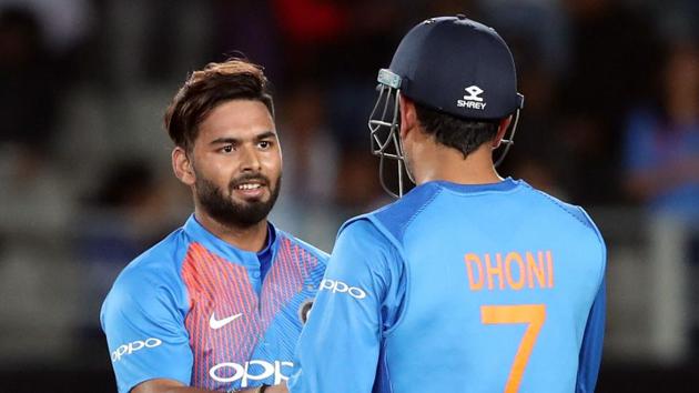 Rishabh Pant and MS Dhoni during the recently concluded T20 series against New Zealand.(AFP)