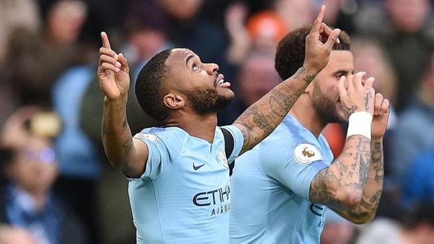 Manchester City's Raheem Sterling (L) celebrates scoring the opening goal.(AFP)