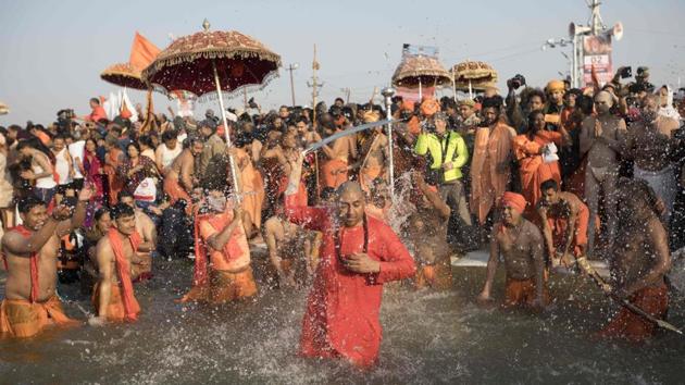 Sadhus bathe at the Sangam on 'Basant Panchami' at the Kumbh Mela in Prayagraj on February 10, 2019. (AFP) Sadhus bathe at the Sangam on 'Basant Panchami' at the Kumbh Mela in Prayagraj on February 10, 2019. (AFP)
