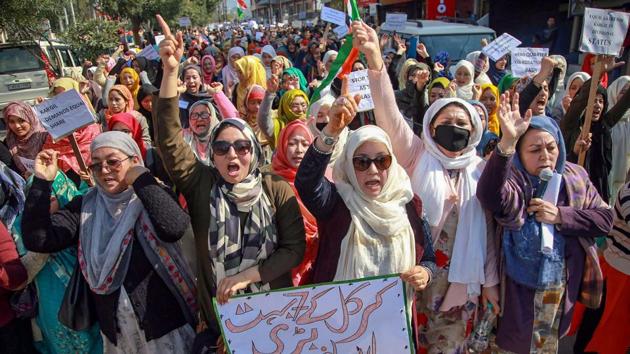 Residents of Kargil district raise slogans during a protest against Leh being made the permanent headquarters of the newly created Ladakh division, in Jammu. The people of Kargil are demanding that divisional commissioner and IGP offices function on rotational basis -- in Kargil during summers and in Leh during winters. (PTI)
