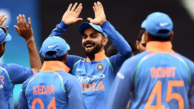 Virat Kohli (C) celebrates with teammates after the dismissal of Australia's Glenn Maxwell. (AFP) Virat Kohli (C) celebrates with teammates after the dismissal of Australia's Glenn Maxwell. (AFP)