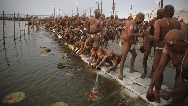 After a purifying bath in the river and a prayer ceremony, the sadhus have to perform “Pind Dan,” a Hindu funeral ritual to pay homage to their ancestors for the salvation of their souls. (Rajesh Kumar Singh / AP)