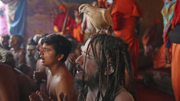 Men of the Juna Akhara participate in a ritual. The Kumbh festival, which UNESCO added to its list of intangible cultural heritage in 2017, runs through early March. About 150 million people are expected to attend. (Rajesh Kumar Singh / AP)