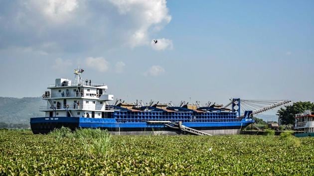 The MV Mango Tree dredger which removed weeds, lands at the Kisumu Port docks. Leggy egrets are delighted, high-stepping through the invasive vegetation but the fishermen are downcast. “If we go fishing now we’ll be stuck in the hyacinth,” said Maurice Omondi, 40, who heads the Kichinjio Fishermen’s Association on one of Kisumu’s beaches. (Brian Ongoro / AFP) 