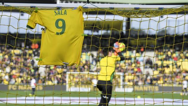 TOPSHOT - A #9 jersey is displayed on the goal in memory of late Argentinian forward Emiliano Sala(AFP)