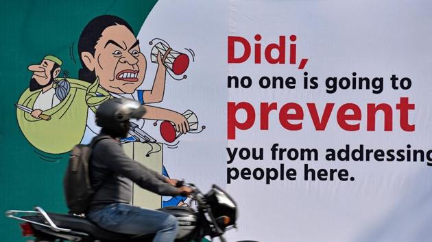 Posters, with satirical messages, welcoming West Bengal chief minister Mamata Banerjee to Delhi popped up at several places as Banerjee landed in the Capital on Tuesday to participate in an Opposition rally.(Sanchit Khanna/HT photo)