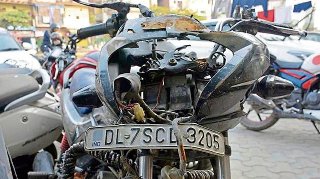 The damaged motorcycle, on which one of the men and the minor were riding when the accident took place. (HT Photo) The damaged motorcycle, on which one of the men and the minor were riding when the accident took place. (HT Photo)