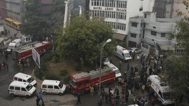 Firefighters seen outside Hotel Arpit Palace after a massive fire broke out at the hotel, at Karol Bagh, in New Delhi, on Tuesday, February 12, 2019. (Sanchit Khanna/HT Photo) Firefighters seen outside Hotel Arpit Palace after a massive fire broke out at the hotel, at Karol Bagh, in New Delhi, on Tuesday, February 12, 2019. (Sanchit Khanna/HT Photo)